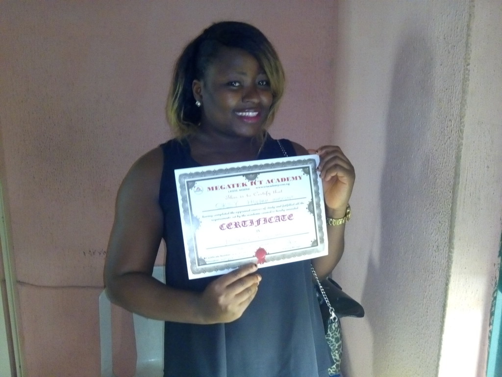 Amarachi displaying her Certificate after Completion of her 